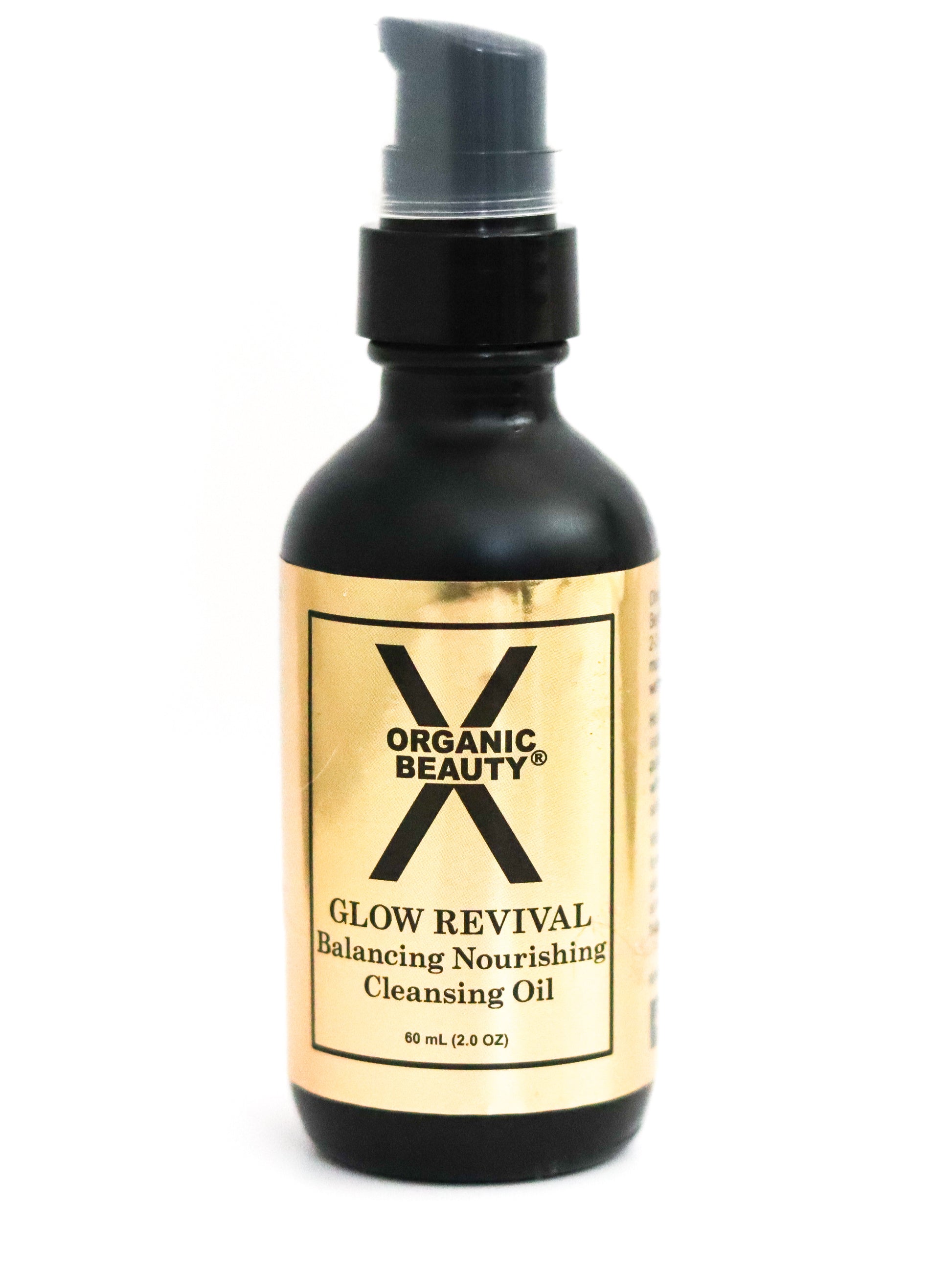 Bottle of X Organic Beauty's Glow Revival Cleansing Oil on a white background